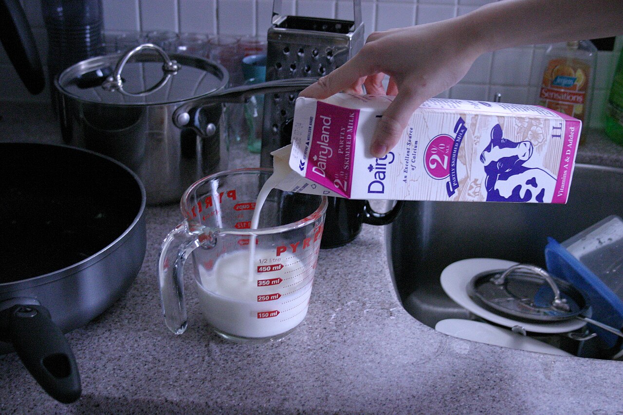 Milk being poured into a glass