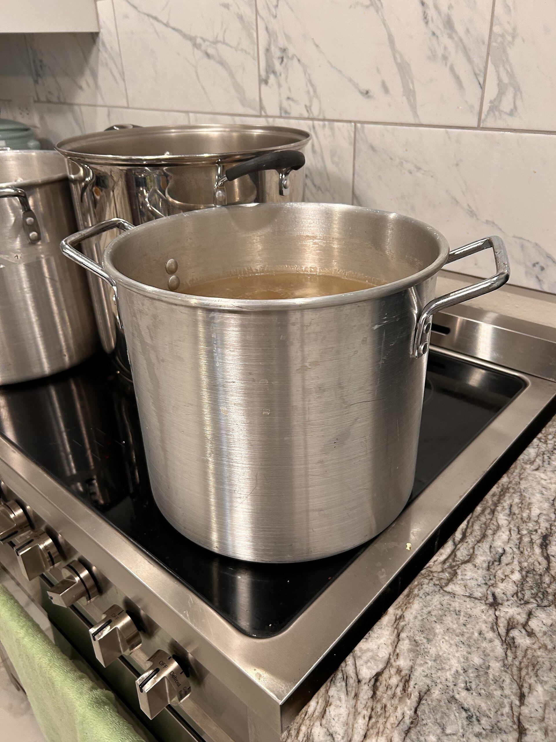 A pot of homemade chicken broth