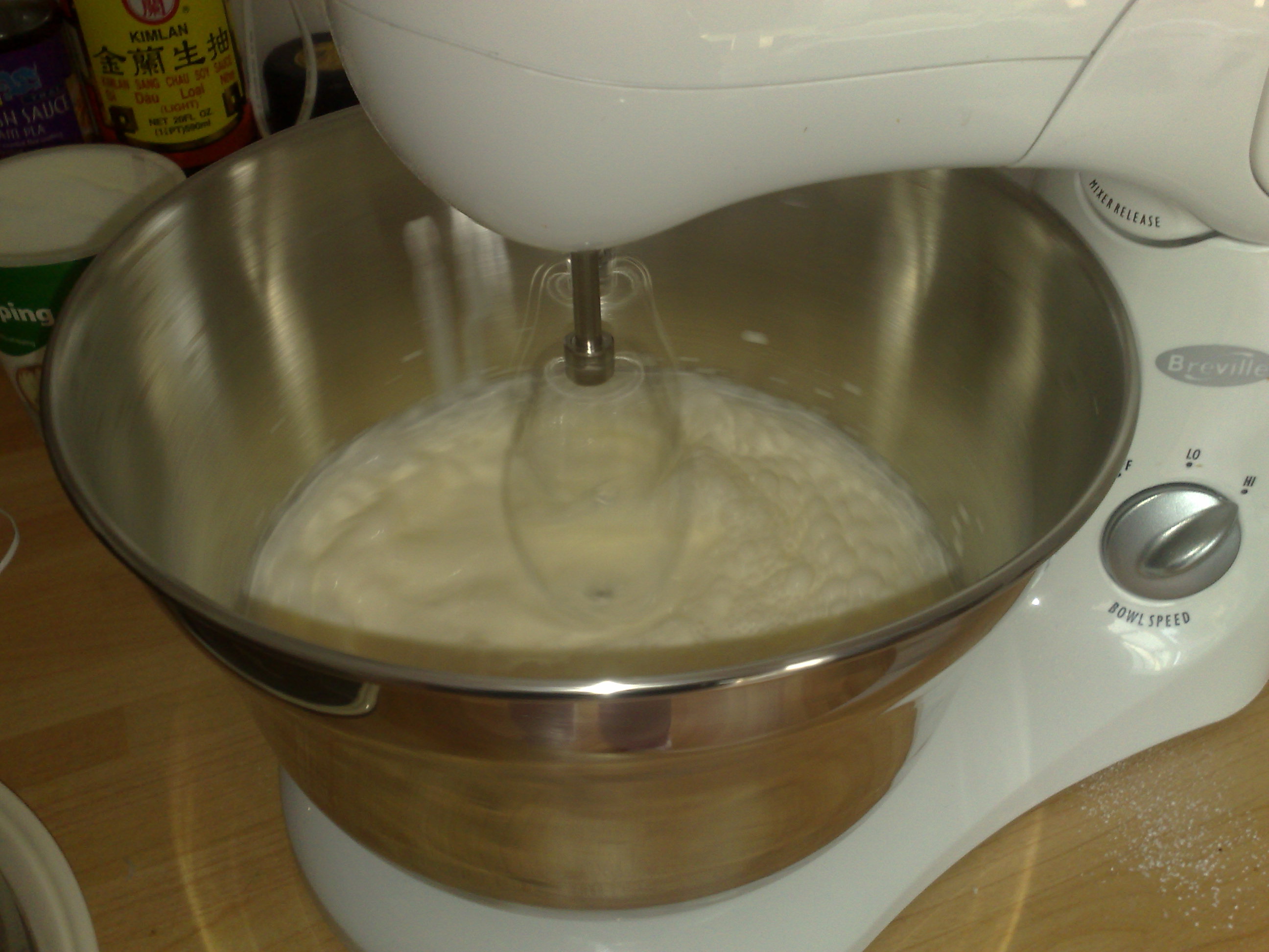 Cream being poured from a jug
