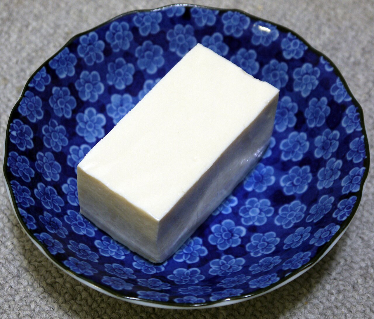 A block of fresh white tofu