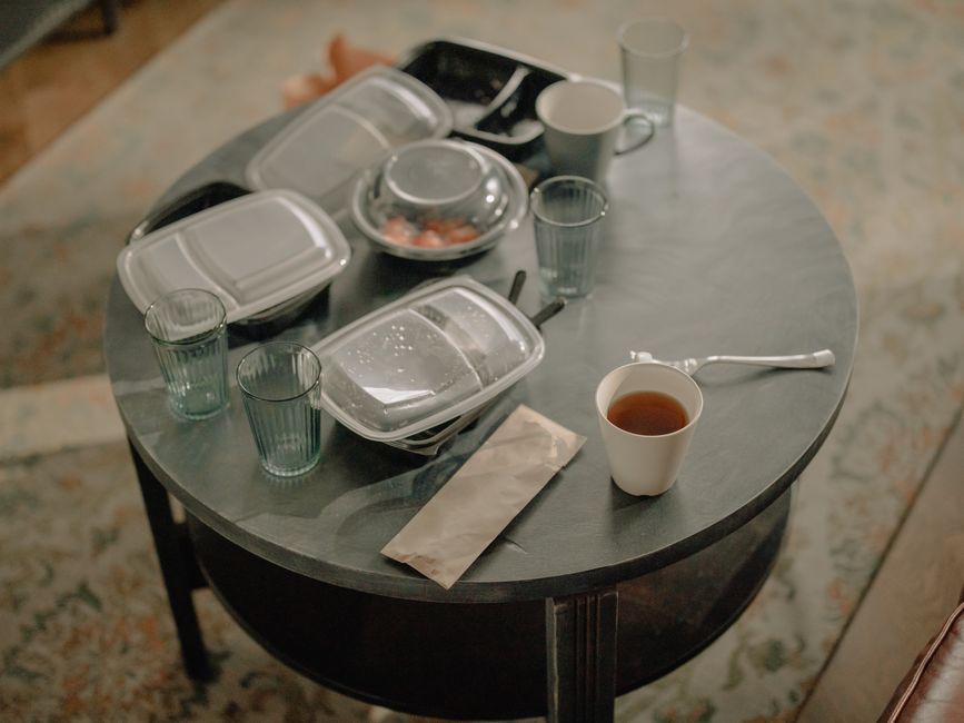 Takeaway food containers on a kitchen table