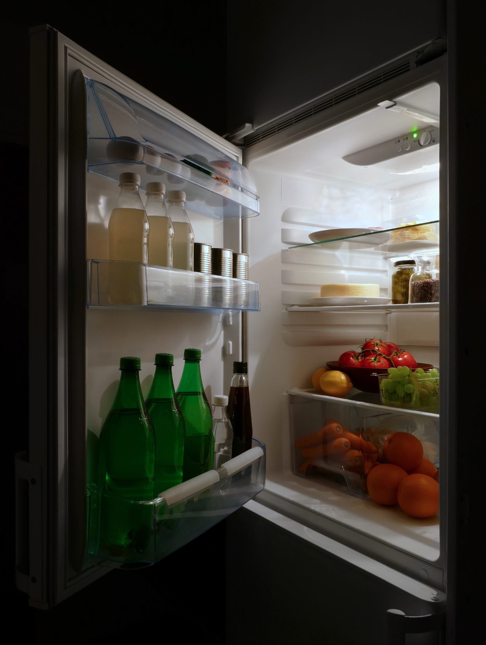 An open fridge stocked with food